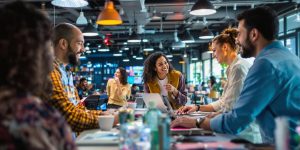 Diverse entrepreneurs collaborating in a modern workspace.